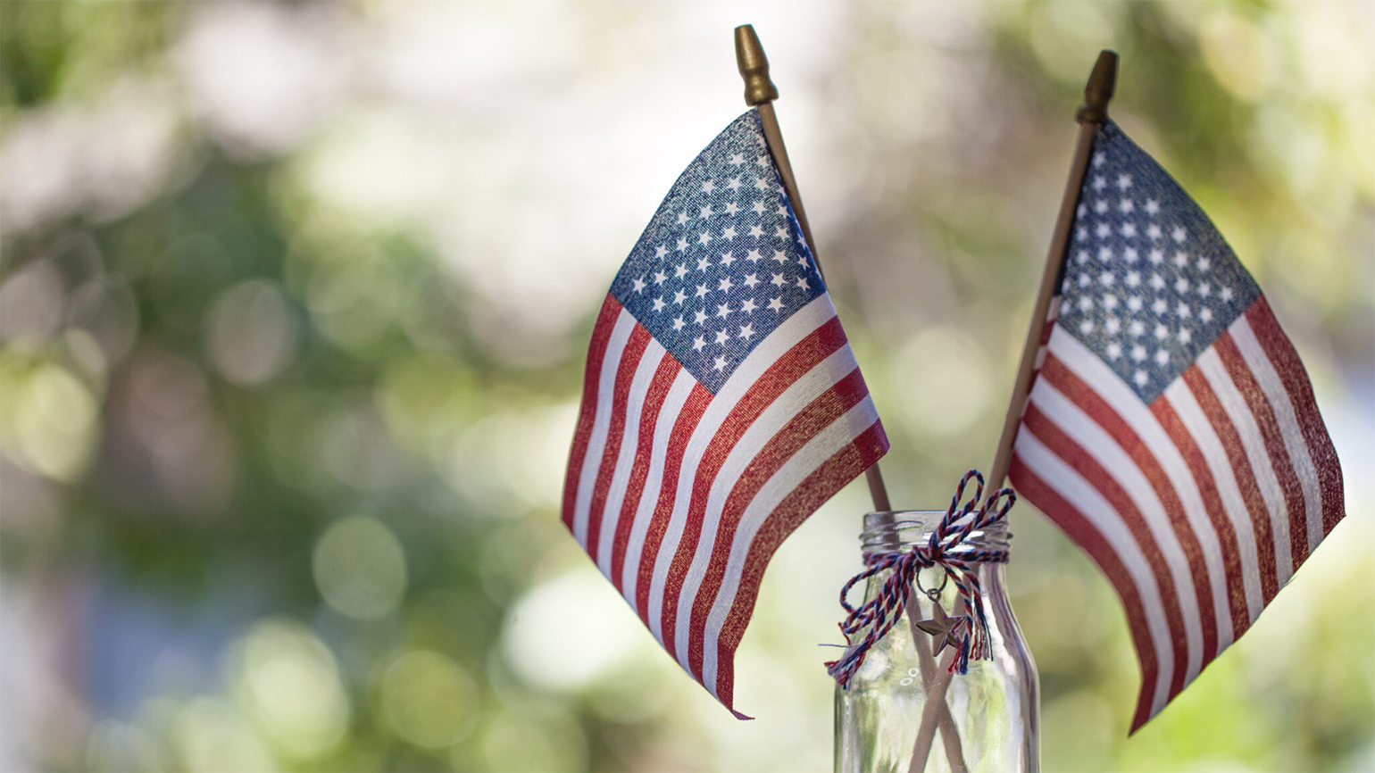 Two small American flags; Shutterstock