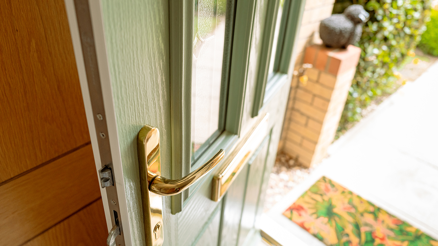A open door to a home; photo: Getty Images