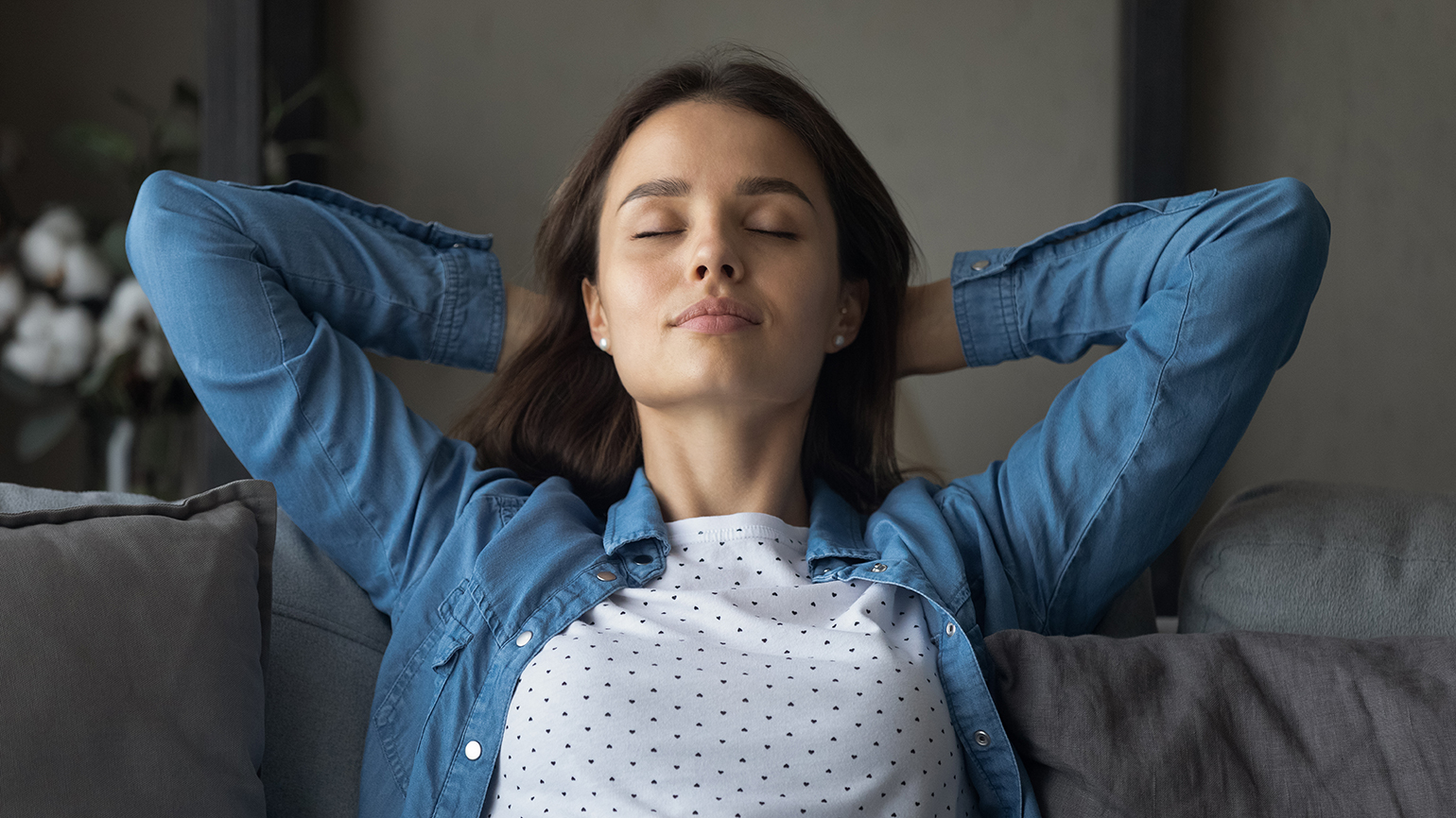 A woman finding calm with a one-word prayer; iStock / Getty Images Plus