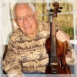 War veteran holding violin