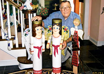 Christmas angels made out of stovepipes