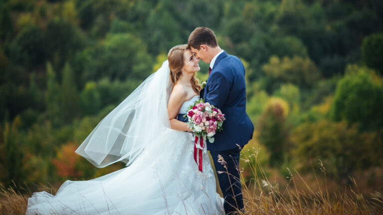 Bride and groom in a field with a Valentine's Day devotional