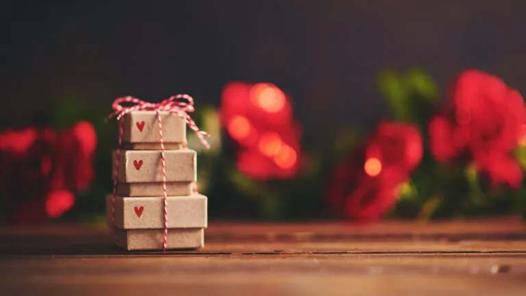 Stack of Valentine's Day gift boxes with devotionals