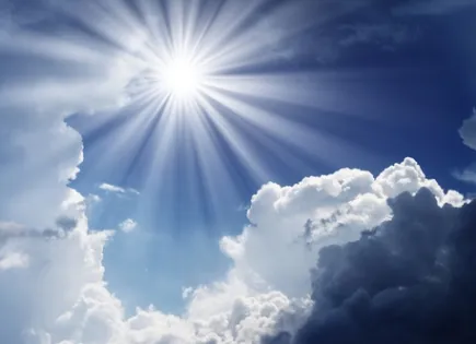 heavenly rays of sun extending through the sky.