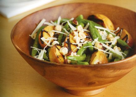 Green Bean and Grilled Peach Salad in a wooden bowl