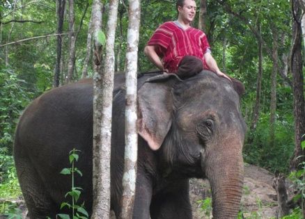 Mysterious Ways blogger Adam Hunter on an elephant on honeymoon in Thailand