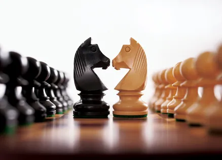 Chess pieces on chess board