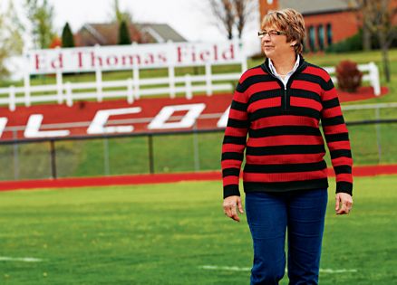 Jan Thomas at the football field named after her late husband