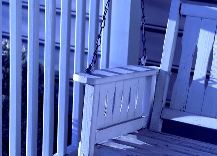 A moonlit porch swing
