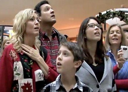 Christmas Shoppers Stop to Listen to Flash Mob Carols at the Mall