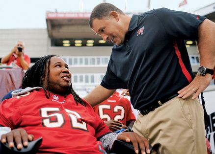 Eric LeGrand with former Rugers coach Greg Schiano