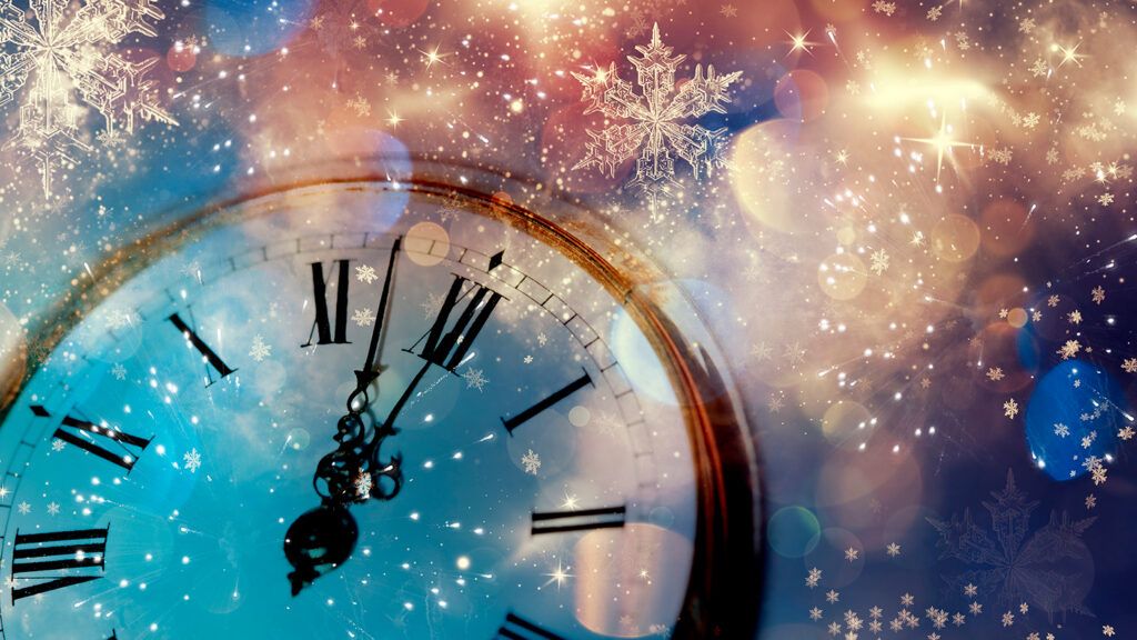 A clock about to strike midnight on New Year's Eve; Getty Images