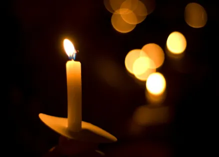 a memorial candle burning