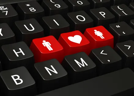 Computer keyboard with universal symbols for man, woman, heart