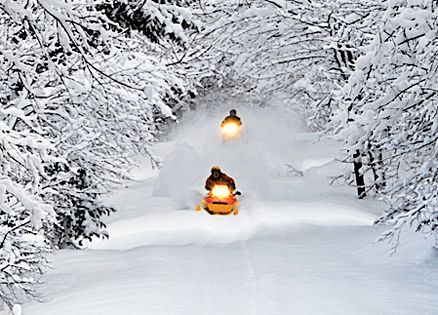 Strangers on golden snowmobiles come to the rescue