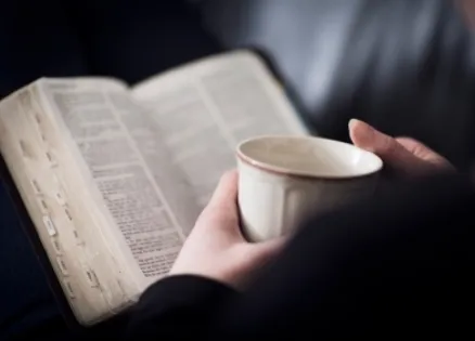 woman reading the Bible