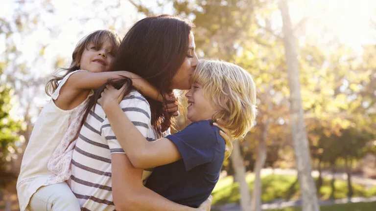 Mom at the park with her two kids after reading devotions on gratitude