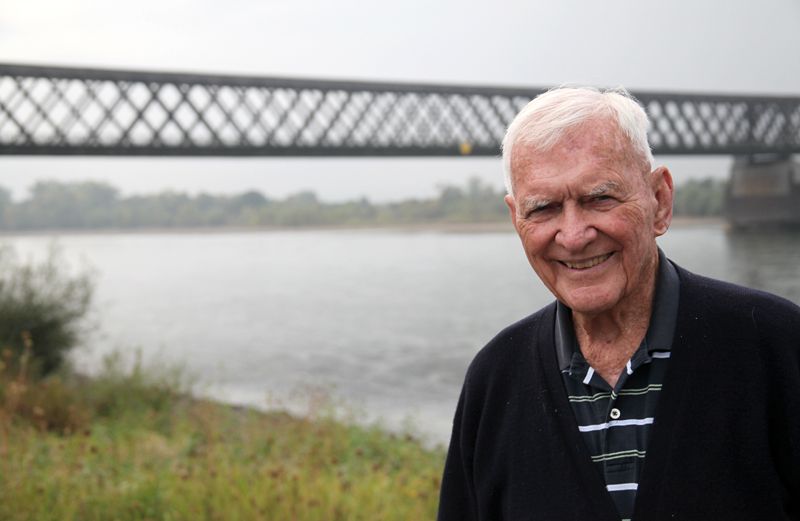 General Albin Irzyk poses in front of the bridge over the Eichel River.