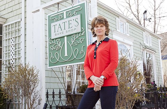 Kathleen King in front of Tates Bake Shop