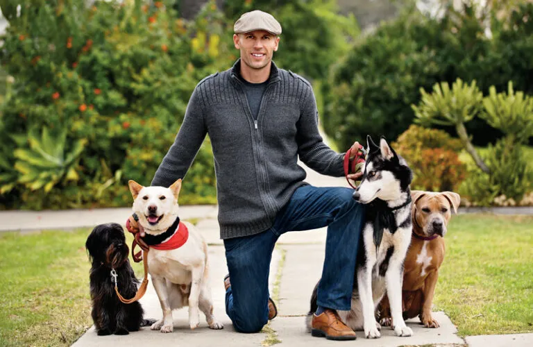 Matt Beisner and his four dogs