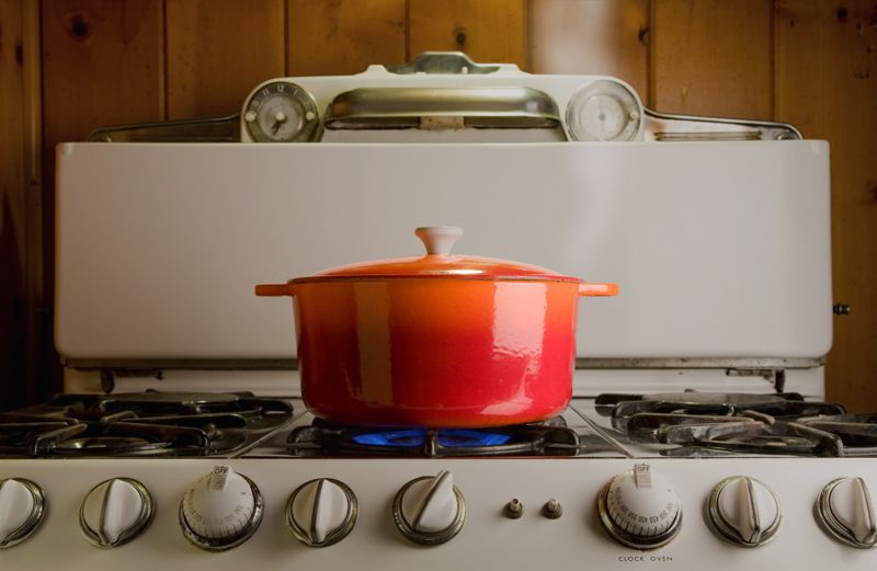 A steaming pot on a stove