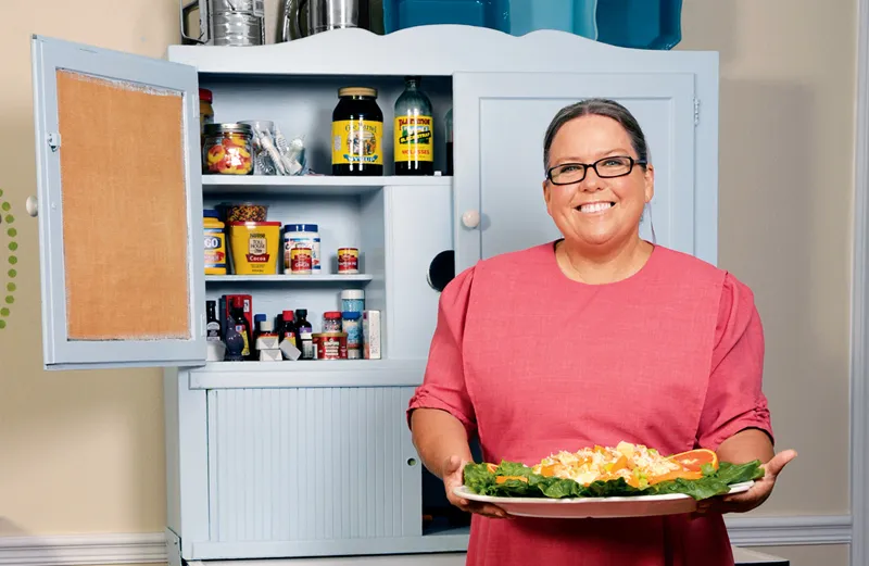 Sherry Gore with a platter of her tropical chicken salad