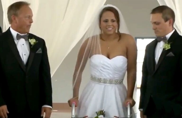 Stevie Beale begins her inspiring march down the aisle.