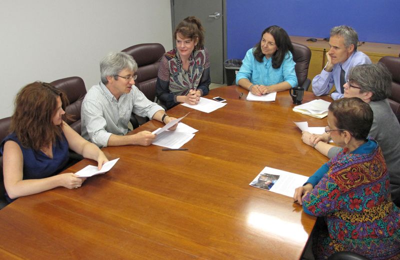 The Guideposts staff sitting around the office conference table