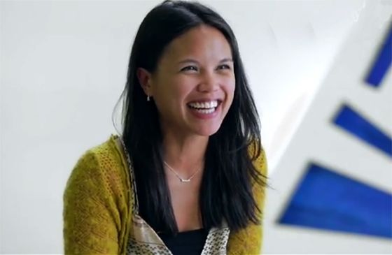 A young woman with a joyful smile