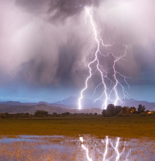 a bolt of lightning against a beautiful stormy sky