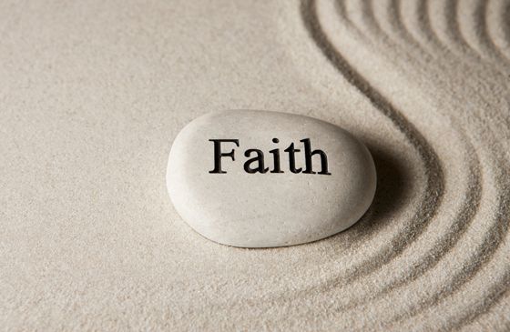 A spirit stone with the word Faith etched in it