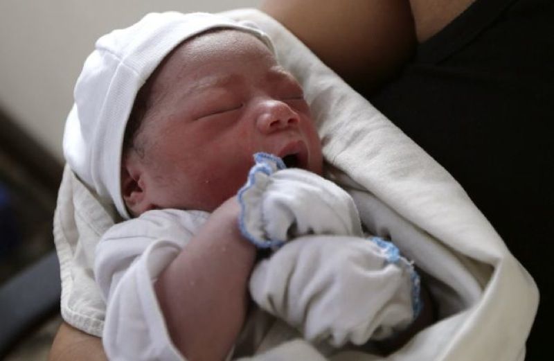 Bea Joy, born after typhoon Haiyan. Photo credit: The AP, via Dailymail.co.uk