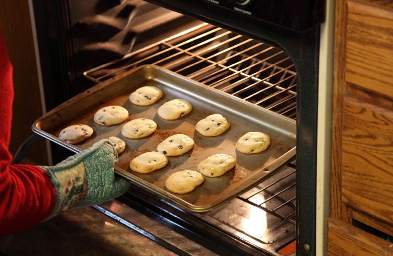 A tray of chocolate chip cookies in the oven