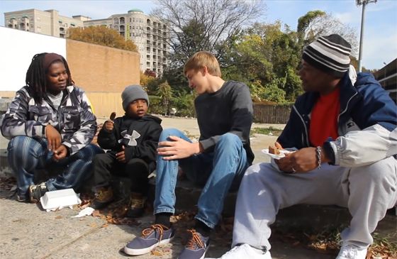 Andrew Hales meets Alfonzo Tatum, his wife, Christine and their son.