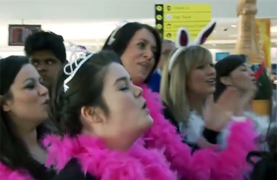 A flash mob performs at George Best Belfast City Airport.