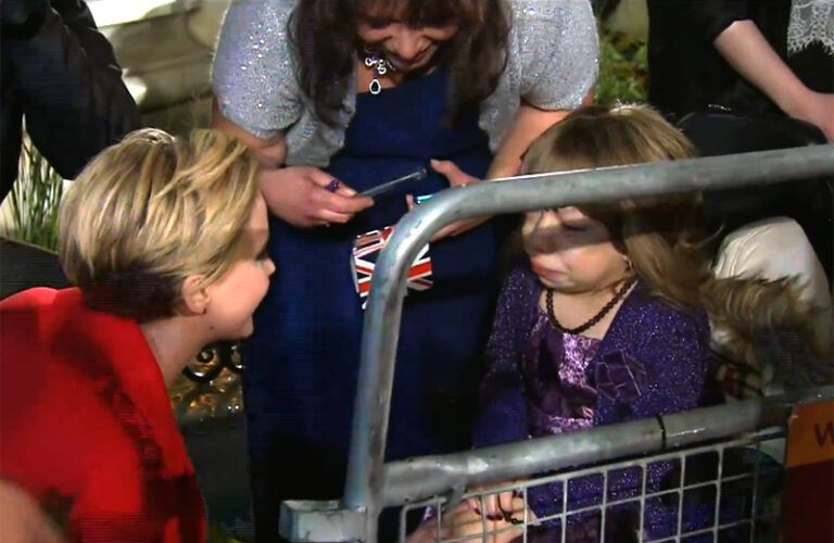 Jennifer Lawrence greets a wheelchair-bound fan, 15-year-old Jessica Hambly.
