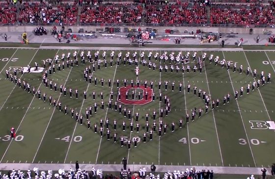 The Ohio State University Band forms the shape of Superman's "S" insignia.