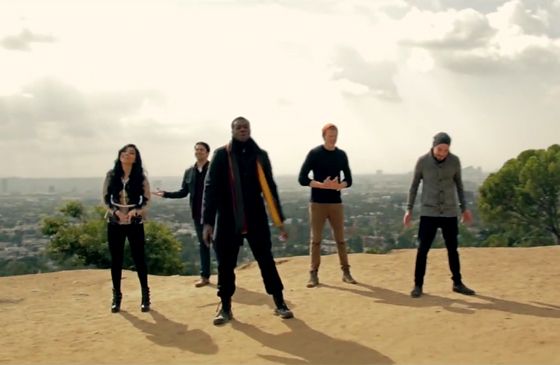 The five members of Pentatonix sing a capella in the open air.