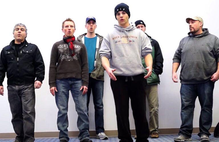 An a capella group known as Face performs at DFW airport.