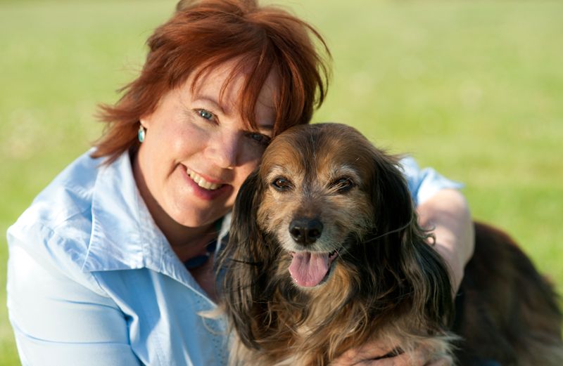 Peggy Frezon with a canine friend