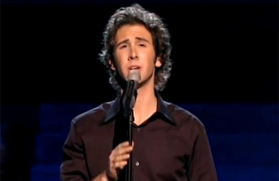 Josh Groban performs for a live audience.