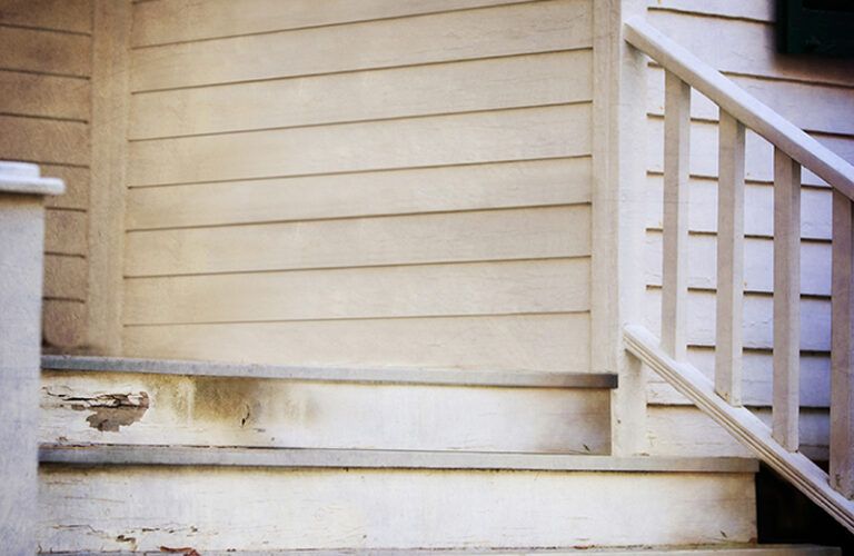 The porch of an old wood house