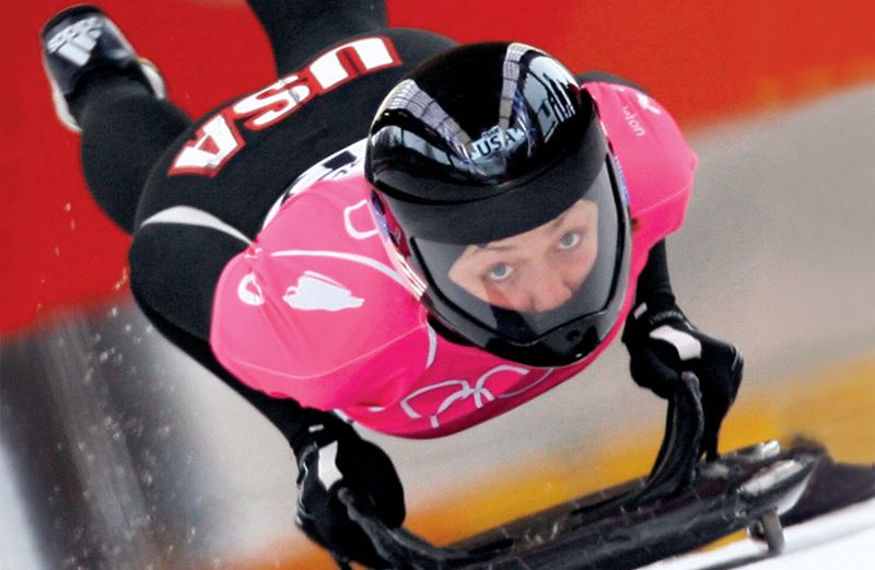 Katie Uhlaender speeds down the track at the 2006 Winter Olympics in Turin.