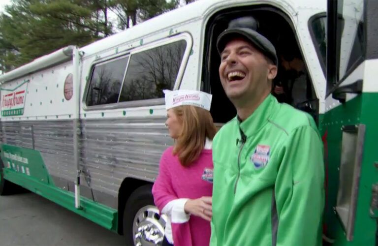 Chris Rosati enjoys a laugh outside his Krispy Kreme bus.