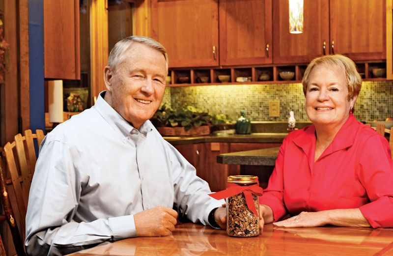 Leon Burns with his wife, Julie, and a jar of his special granola