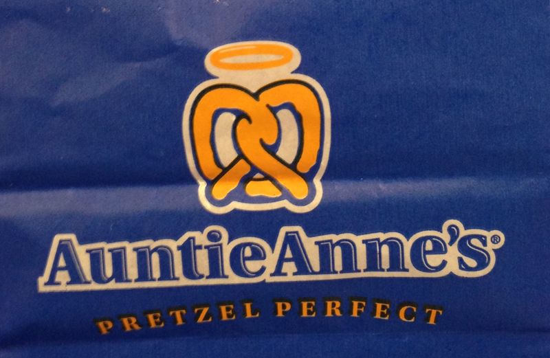 Auntie Anne's pretzel bag, with a halo over a pretzel looking like angel wings