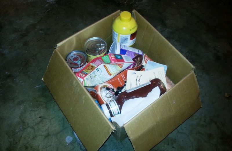 a box of items to be donated to a food pantry
