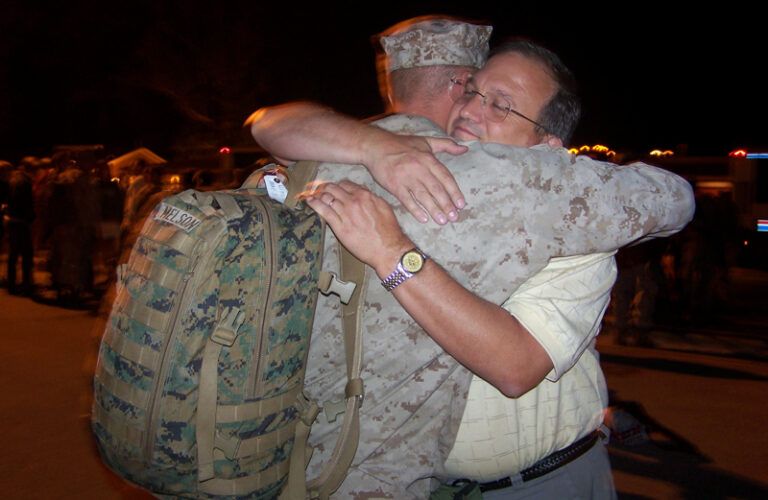 Outreach Ministries blogger Edie Melson's son saying goodbye before deployment