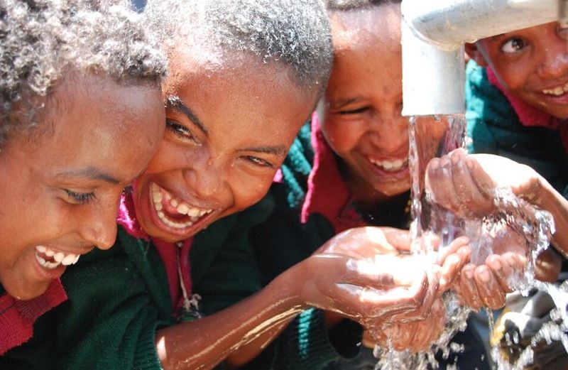 Children enjoying clean water. Photo credit: twitter.com/generositywater