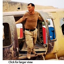 Bobby Heline exiting a helicopter in Iraq